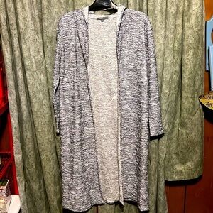 Long, hooded cardigan.